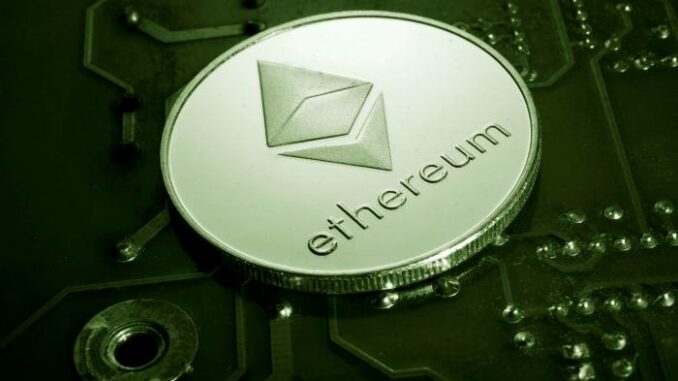 Picture of an Ethereum coin on a circuit board, as TIME Magazine to hold the asset on its balance sheet