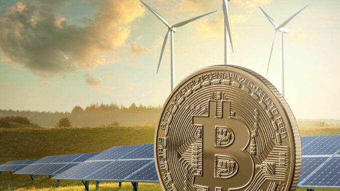 Picture of a Bitcoin with wind vanes and solan panels behind it