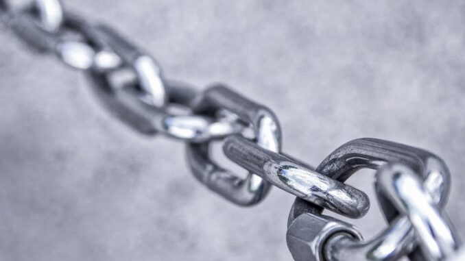 On-Chain, a single chain, black and white
