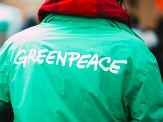 Ripple, Greenpeace logo in jacket