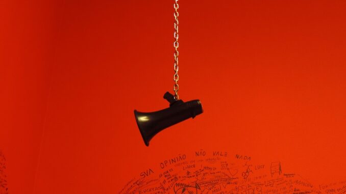 Coin Center, a hanging megaphone