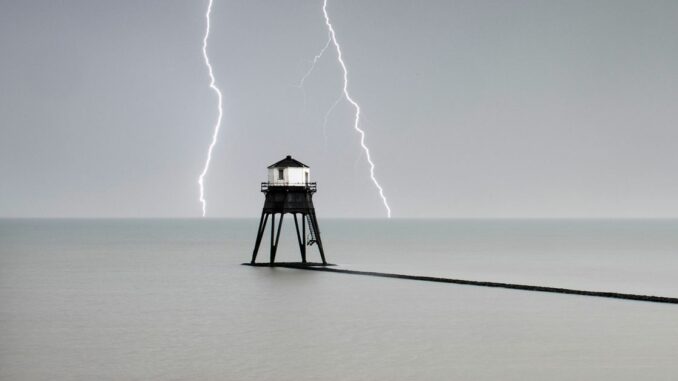 CDCROP: Lighthouse ocean lightning strikes (Historic England Archive/Heritage Images via Getty Images)