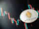 Silver Ethereum with candle stick graph chart and digital background