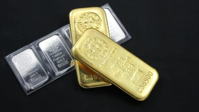 Gold surges past $5,000 for first time as silver tops $107 on safe-haven buying